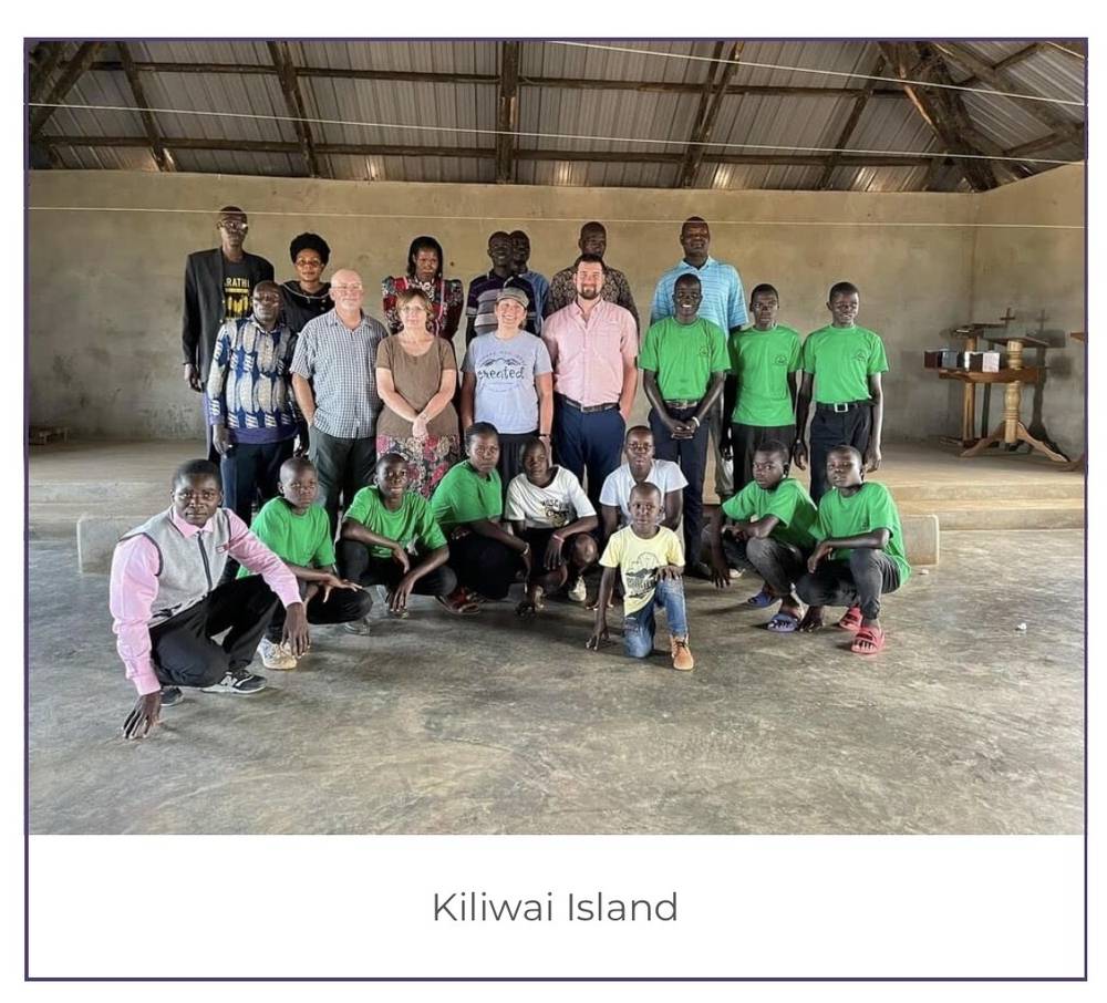 Team with congregation inside island church